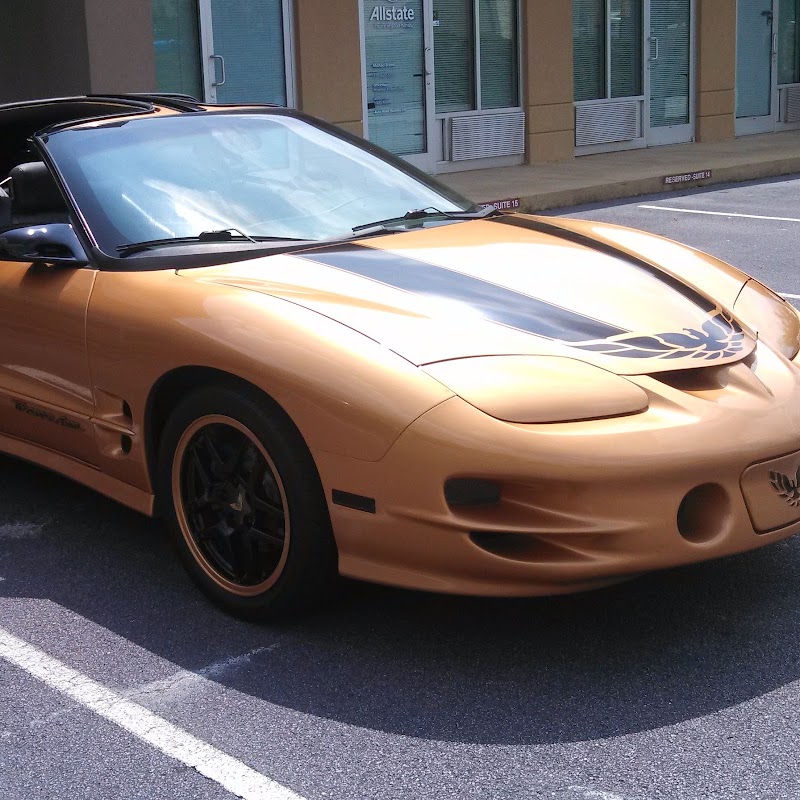 Storm working with a client at ChynaStormm's barbershop