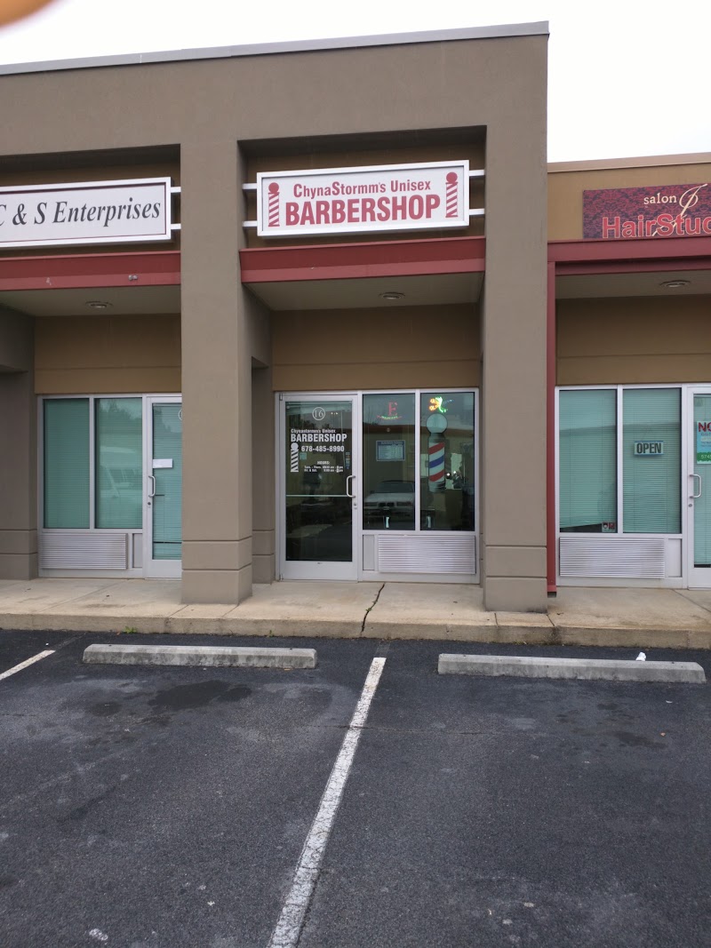 Fresh fade haircut completed at ChynaStormm's barbershop