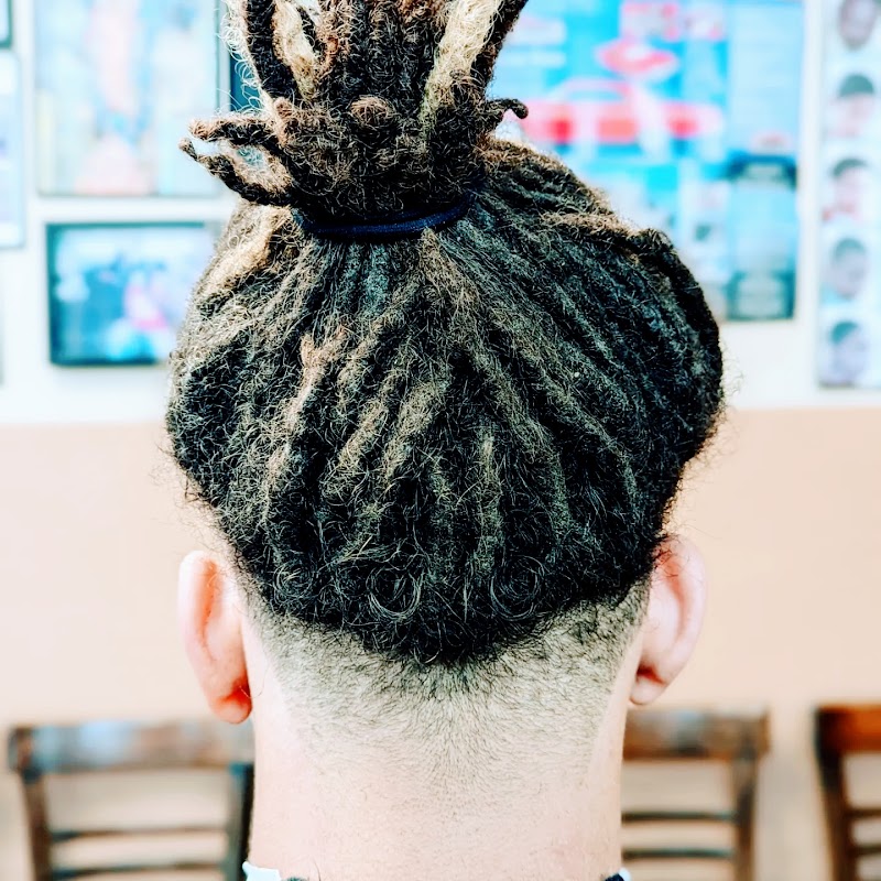 Detailed hair work at ChynaStormm's Unisex Barbershop