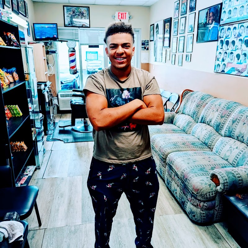 Another satisfied client at ChynaStormm's barbershop